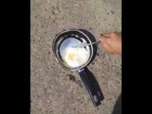 Ara&ccedil;ua&iacute; bate recorde de calor em Minas e moradora frita ovo no asfalto, assista ao video