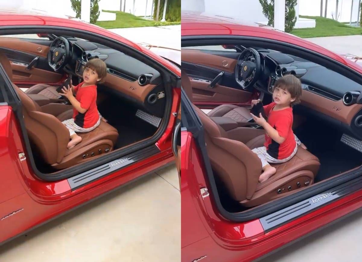 Gusttavo Lima mostra filho brincando em sua Ferrari avaliada em R$ 1,3 milh&atilde;o