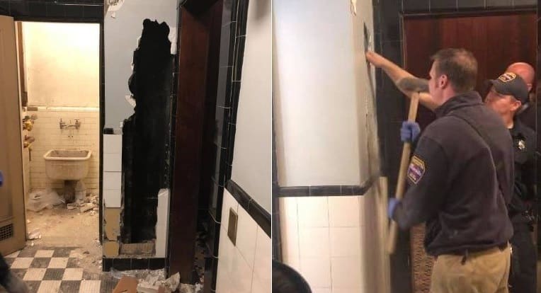 Equipe de resgate retirada homem nu preso em parede de teatro
