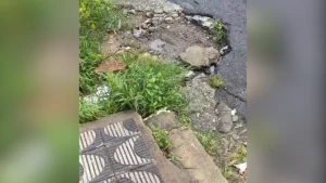 Morador denuncia cal&ccedil;ada irregular e buraco em Divin&oacute;polis