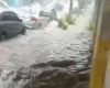 Enxurrada em Divinópolis inunda totalmente a rua Rio de Janeiro