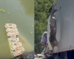 Carreta cai no Rio Pará após colisão com caminhão na BR-352, entre Pitangui e Martinho Campos