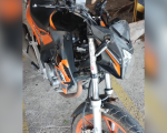 Motociclista fica ferido após ser atingido por carro que fugiu sem prestar socorro em Divinópolis