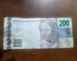 Casal é preso após fazer compra com nota falsa de R$ 200 em Divinópolis