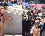 Mulher é detida por pichar estátua durante protesto na Praça da Estação, em BH
