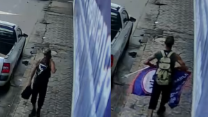Homem furta banner na porta de loja em Divin&oacute;polis