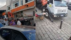 Caminhão perde freio, bate em carro e atinge fachada de loja em Itapecerica