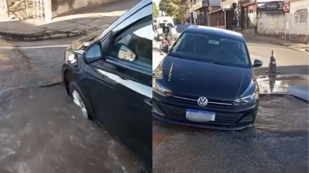 Adutora da Copasa rompe e carro cai em buraco no Planalto, em Divin&oacute;polis