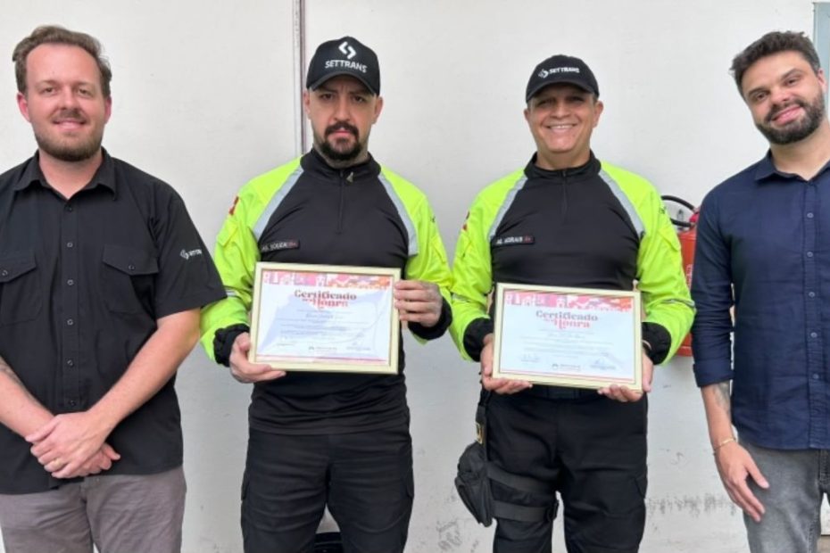 Agentes de tr&acirc;nsito Glenes Gil Silva Morais e Marcus Vinicius de Souza recebem homenagem ap&oacute;s salvar crian&ccedil;a de inc&ecirc;ndio em Divin&oacute;polis
