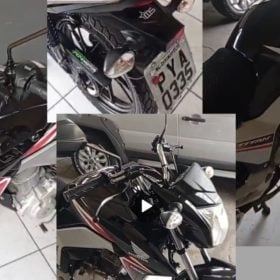 Moto Honda Titan 160 preta com detalhes vermelhos furtada na comunidade de Passagem, em Divinópolis