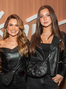 Caçula de Flávia Alessandra e Otaviano Costa chama atenção por sua altura durante o Rock in Rio