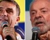 Flávio Bolsonaro durante evento de campanha; candidato confirmou presença no debate da Band.