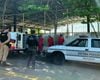 Policiais militares e penais durante operação de remoção de pichações em Bom Despacho