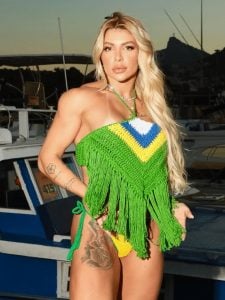 Modelo Nicole Fagundes, ex-bailarina do Faust&atilde;o, &eacute; apontada como poss&iacute;vel envolvimento amoroso de Belo durante crise com Rayane Figliuzzi